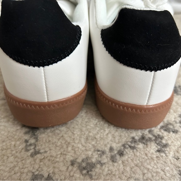Dressy sneakers, never been worn, white with touches of black and brown. - Picture 2 of 3
